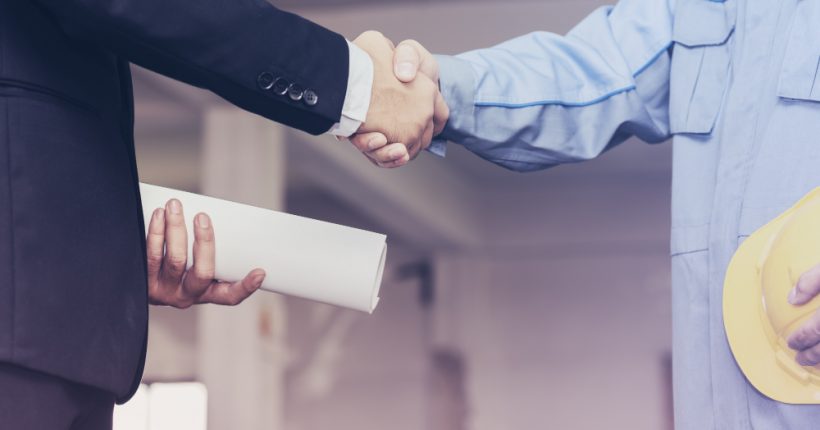 architect-engineer-shaking-hands-with-businessman-site